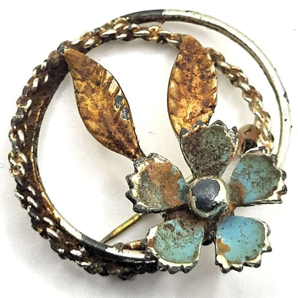 Vintage Worn Blue Enamel Flower Brooch Gold-toned leaves Braided Circular Frame